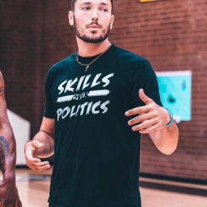 'SKILLS OVER POLITICS' T-SHIRT